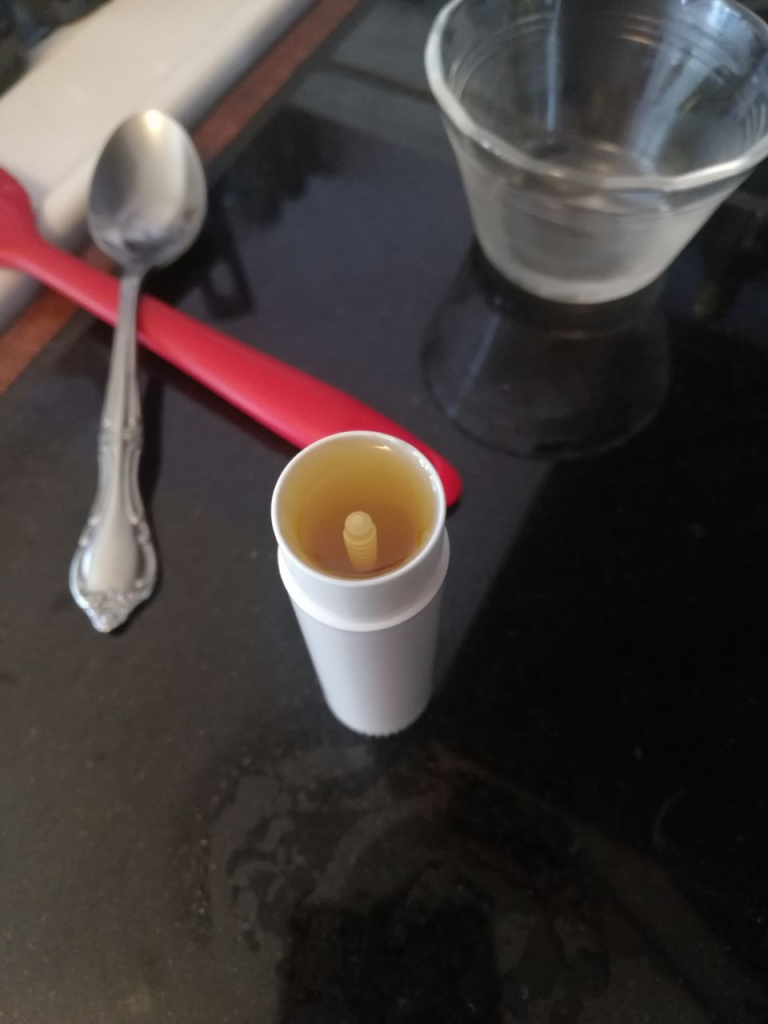super easy DIY lip balm in container