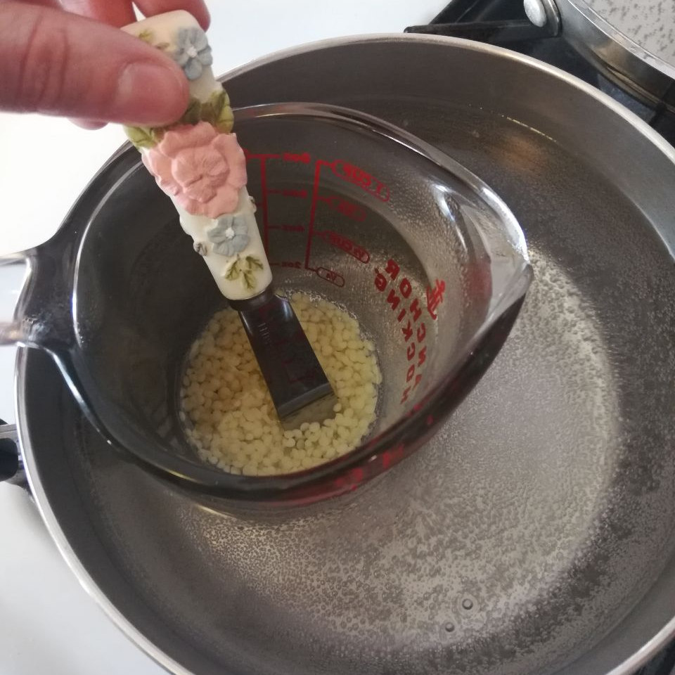 beeswax pastilles melting in recipe for super easy diy lip balm